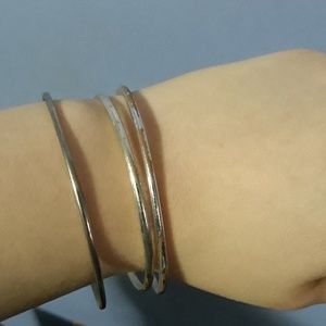 3 silver bracelets